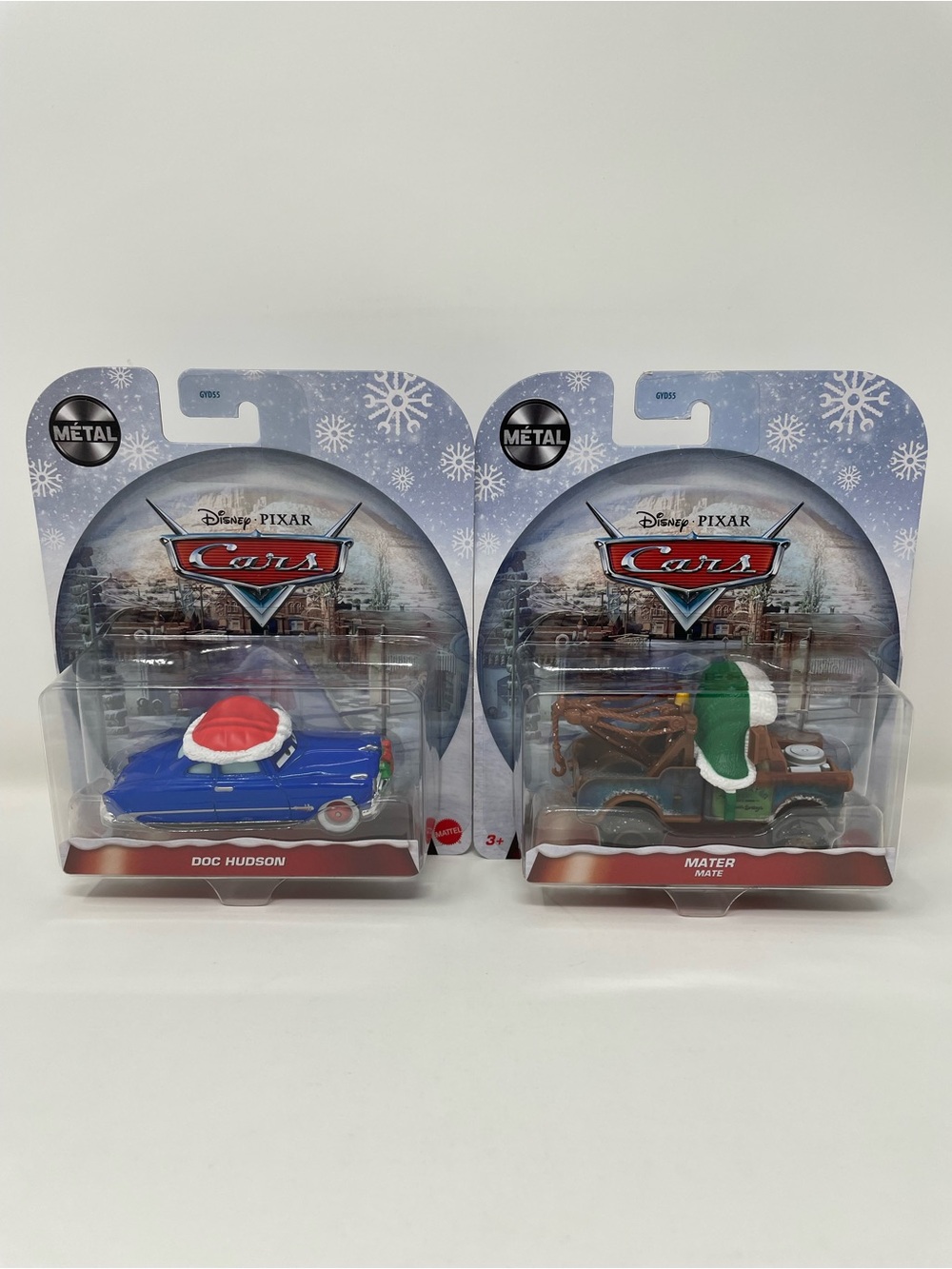 Disney Pixar Cars Christmas Winter Holiday (Mater & Doc) Sealed New LOT OF 2